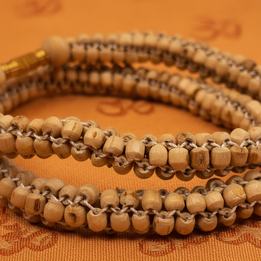 Tulsi Mala — Saffron Om Background