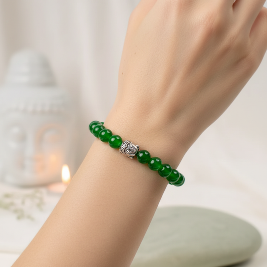Woman wearing Green Aventurine bracelet with Buddha charm - wrist shot