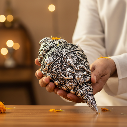 Ganesh Shankh – Man Holding