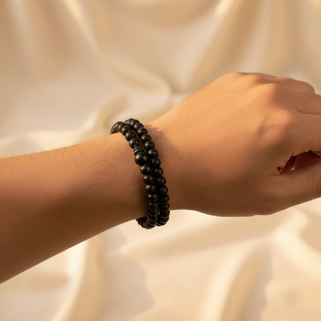 Man Wearing Black Beaded Mala Bracelet - Wrist Shot
