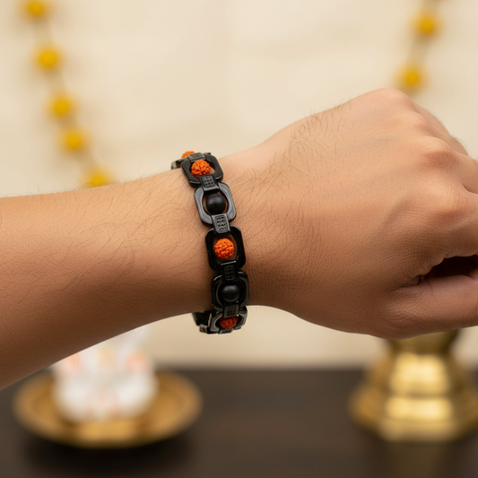 Man wearing Metal Rudraksha and Karungali Bracelet - Black - wrist shot