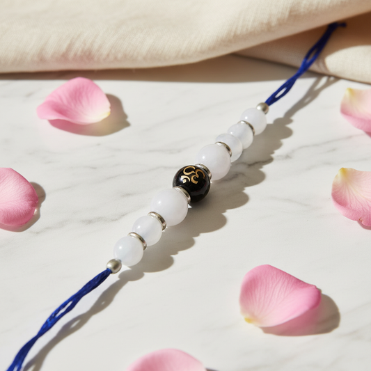Rose Quartz OM Rakhi - BG Changed with Rose Petals